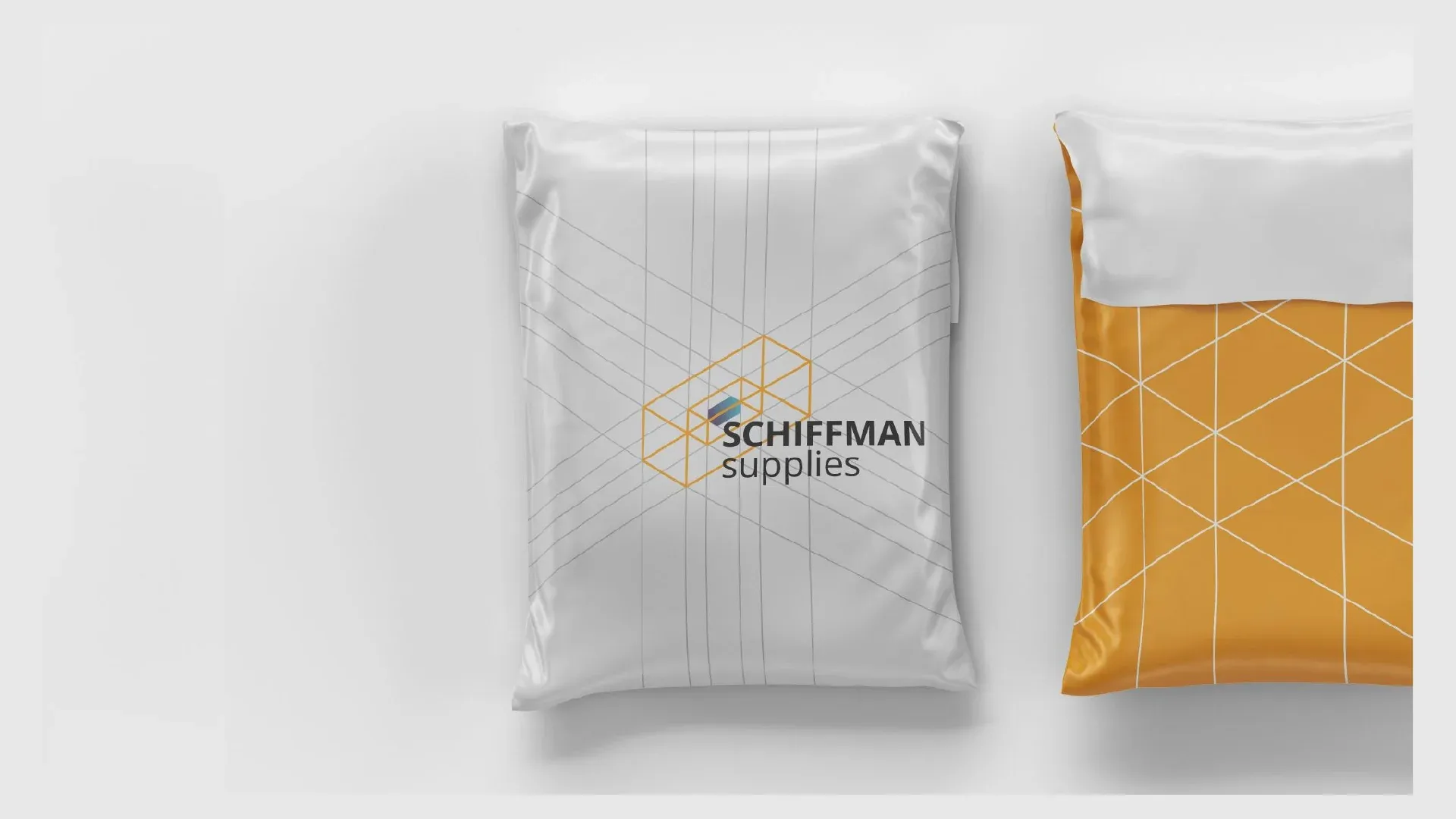 White and yellow shipping bags carrying the Schiffman mark and line pattern.